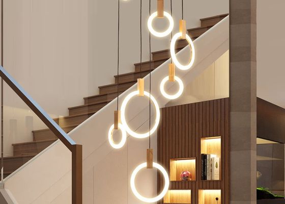 Dispositivo elétrico de iluminação acrílico da lâmpada da gota da sala de jantar do hotel da escada da casa de campo do círculo moderno